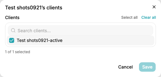 The client assignments dialog opened from a member's row on the Team page: a search field and a checklist of active clients